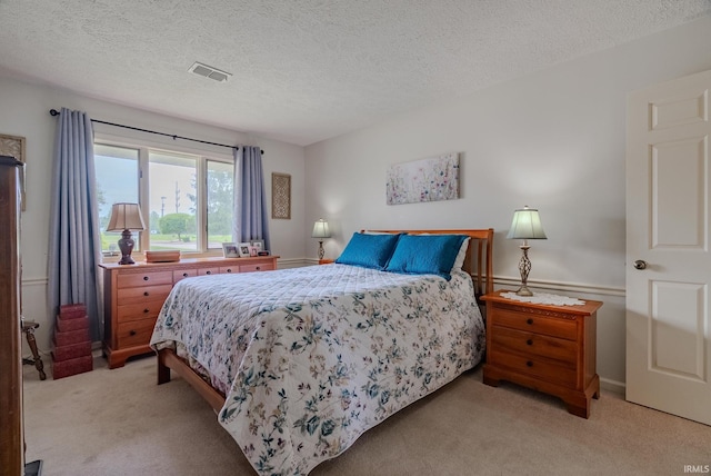 4635 S Bellamy Blvd, Marion, IN 46953 - bedroom with light colored carpet and a textured ceiling