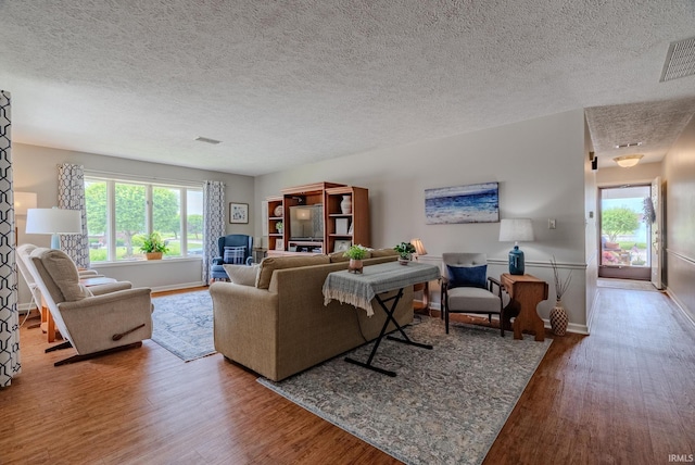 4635 S Bellamy Blvd, Marion, IN 46953 - living room featuring wood finished floors and a textured ceiling