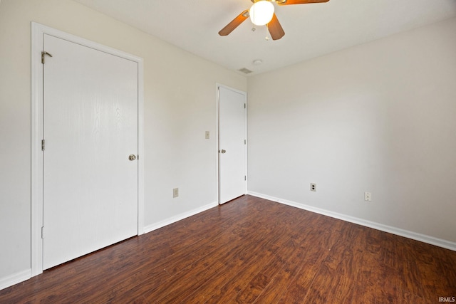 3316 Ingram Ct, Lafayette, IN 47906 - unfurnished bedroom featuring dark wood finished floors, baseboards, and a ceiling fan