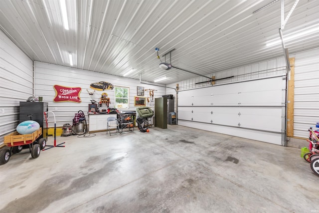 409 E Strain St, Fort Branch, IN 47648 - garage featuring a garage door opener