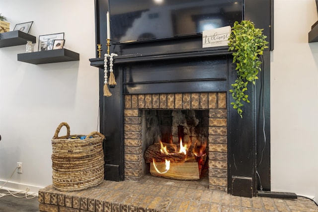 409 E Strain St, Fort Branch, IN 47648 - detailed view of a fireplace and baseboards