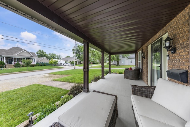 409 E Strain St, Fort Branch, IN 47648 - covered porch featuring a residential view and a lawn
