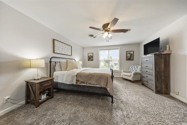 409 E Strain St, Fort Branch, IN 47648 - bedroom featuring baseboards, carpet, and a ceiling fan