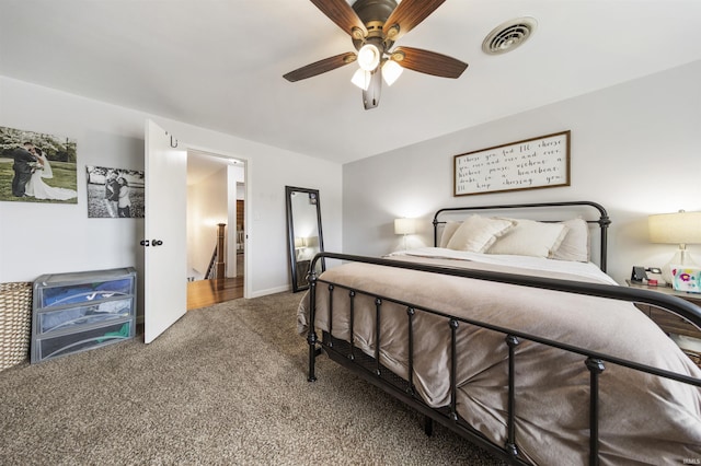 409 E Strain St, Fort Branch, IN 47648 - bedroom with carpet floors and a ceiling fan