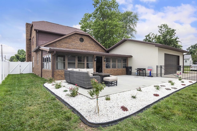 409 E Strain St, Fort Branch, IN 47648 - back of property featuring a gate, brick siding, a patio, an outdoor living space, and a chimney