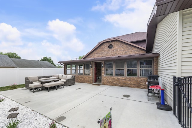 409 E Strain St, Fort Branch, IN 47648 - fenced backyard with outdoor lounge area and a patio area