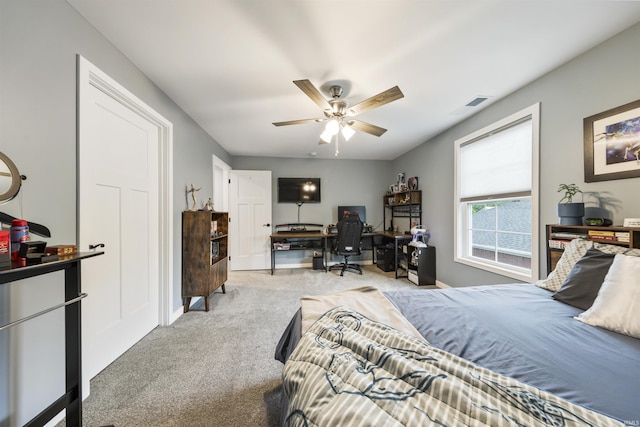 1215 Ladbrooke Dr, Evansville, IN 47725 - bedroom with carpet flooring, a desk, and ceiling fan