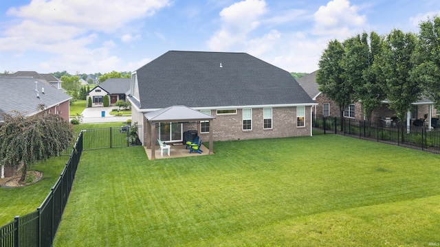 1215 Ladbrooke Dr, Evansville, IN 47725 - rear view of house with a gazebo, a patio area, brick siding, and a shingled roof