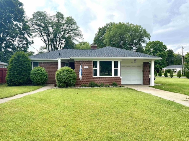 1741 Rockne Dr, South Bend, IN 46617 - ranch-style house featuring brick siding, an attached garage, a front lawn, and driveway
