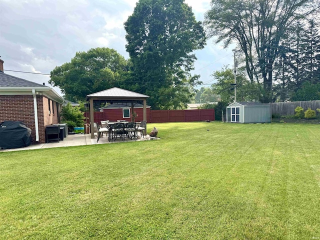 1741 Rockne Dr, South Bend, IN 46617 - fenced backyard featuring a gazebo, a patio area, and a storage shed
