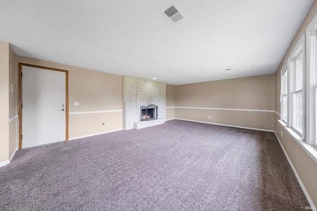 6320 Wakopa Ct, Fort Wayne, IN 46815 - unfurnished living room featuring dark carpet, a fireplace, and baseboards