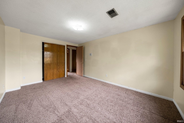 6320 Wakopa Ct, Fort Wayne, IN 46815 - carpeted empty room with baseboards and a textured ceiling