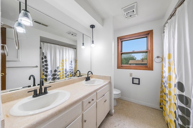 6320 Wakopa Ct, Fort Wayne, IN 46815 - bathroom with double vanity, baseboards, toilet, and a shower with shower curtain