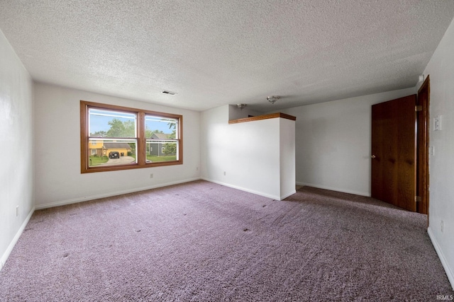 6320 Wakopa Ct, Fort Wayne, IN 46815 - unfurnished room with carpet floors, a textured ceiling, and baseboards