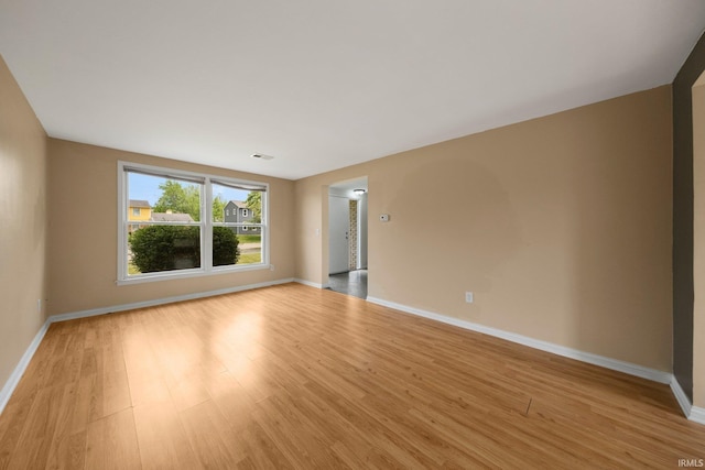 6320 Wakopa Ct, Fort Wayne, IN 46815 - spare room with light wood-type flooring and baseboards