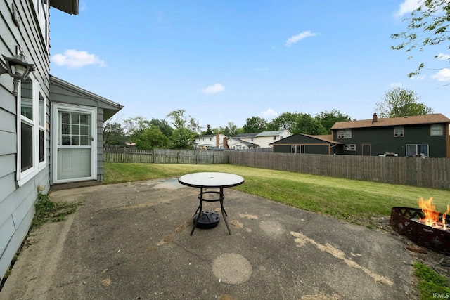 6320 Wakopa Ct, Fort Wayne, IN 46815 - view of patio / terrace with a fire pit and a residential view