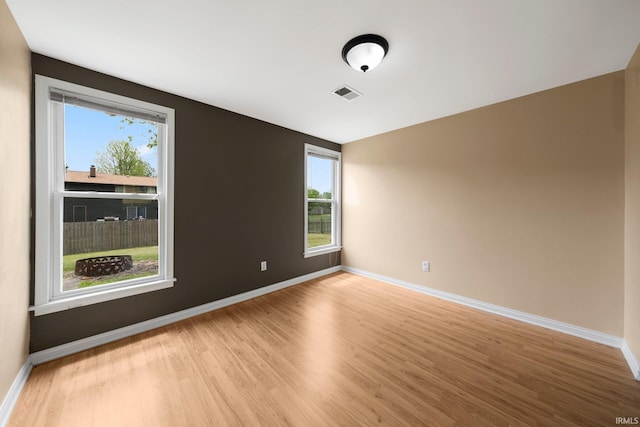 6320 Wakopa Ct, Fort Wayne, IN 46815 - spare room featuring light wood finished floors, plenty of natural light, and baseboards