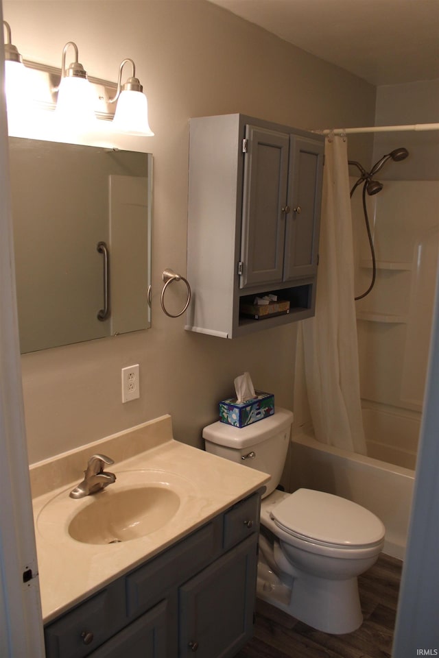 104 Tulip Ave, Evansville, IN 47711 - bathroom featuring toilet, vanity, shower / bath combination with curtain, and wood finished floors