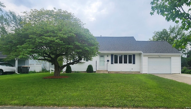 2703 Bosworth Dr, Fort Wayne, IN 46805 - view of front facade featuring entry steps, an attached garage, a front yard, roof with shingles, and driveway