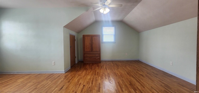 2703 Bosworth Dr, Fort Wayne, IN 46805 - additional living space featuring ceiling fan, light wood finished floors, lofted ceiling, and baseboards