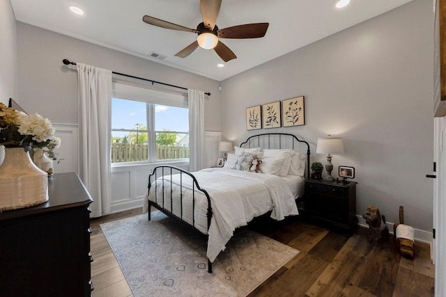 15306 Covington Rd, Fort Wayne, IN 46814 - bedroom with wood finished floors, recessed lighting, a wainscoted wall, a ceiling fan, and a decorative wall