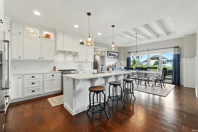 284 Savo Rock Ct, Fort Wayne, IN 46845 - kitchen with stainless steel appliances, light countertops, white cabinetry, tasteful backsplash, and recessed lighting
