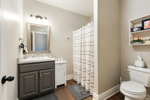 284 Savo Rock Ct, Fort Wayne, IN 46845 - bathroom with vanity, wood finished floors, toilet, and a shower with shower curtain