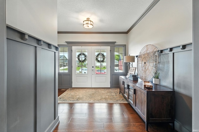 284 Savo Rock Ct, Fort Wayne, IN 46845 - foyer with crown molding, a textured ceiling, french doors, and dark wood-style flooring
