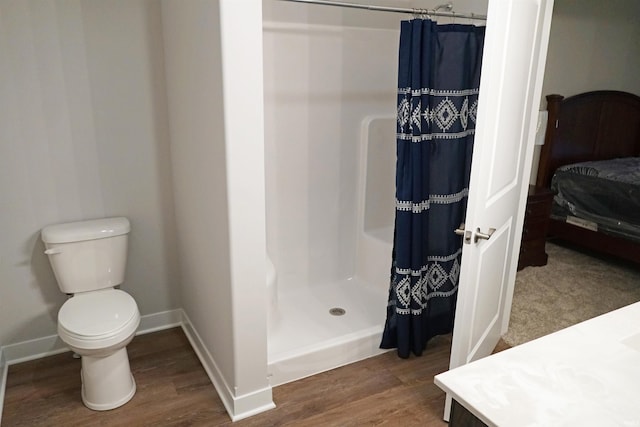 19 Conner St, Wabash, IN 46992 - full bathroom with wood finished floors, toilet, a shower with curtain, and baseboards