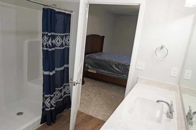 19 Conner St, Wabash, IN 46992 - ensuite bathroom with a shower with curtain, wood finished floors, and vanity