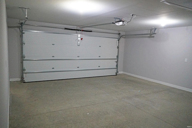 19 Conner St, Wabash, IN 46992 - garage featuring baseboards and a garage door opener