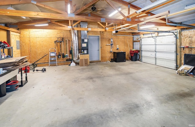 301 S Mccreary St, Fort Branch, IN 47648 - garage with a workshop area and a garage door opener