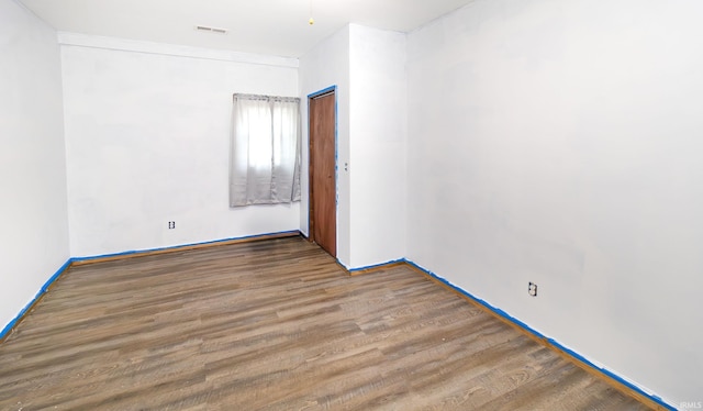 301 S Mccreary St, Fort Branch, IN 47648 - unfurnished room with wood finished floors and baseboards