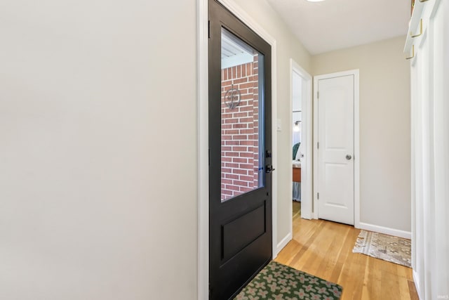 5987 E 100 N, Franklin, IN 46131 - doorway to outside with light wood-type flooring and baseboards