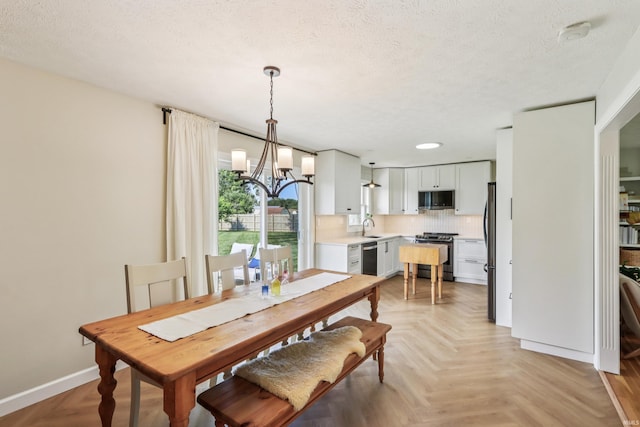 5987 E 100 N, Franklin, IN 46131 - dining area featuring a chandelier, a textured ceiling, baseboards, and recessed lighting