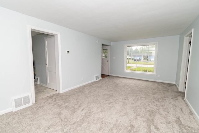 1307 Cassopolis St, Elkhart, IN 46514 - carpeted empty room with baseboards