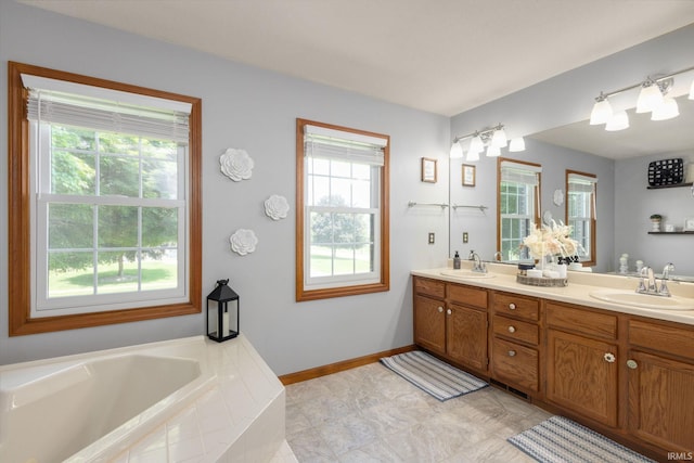 58679 Baugo Xing, Elkhart, IN 46517 - full bathroom featuring double vanity and a garden tub