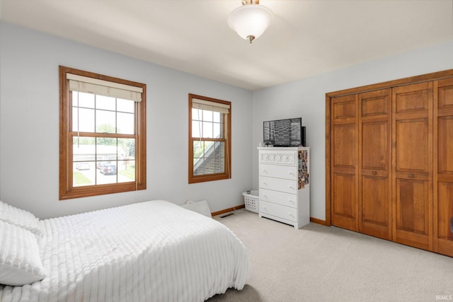 58679 Baugo Xing, Elkhart, IN 46517 - bedroom with light colored carpet and a closet