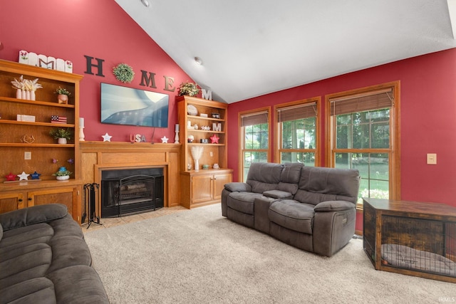 58679 Baugo Xing, Elkhart, IN 46517 - carpeted living room with lofted ceiling and a fireplace with flush hearth