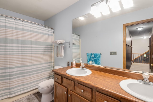 58679 Baugo Xing, Elkhart, IN 46517 - bathroom with double vanity and a shower with shower curtain