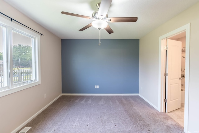 2502 Trillium Cv, Huntertown, IN 46748 - unfurnished room with carpet floors, ceiling fan, and baseboards
