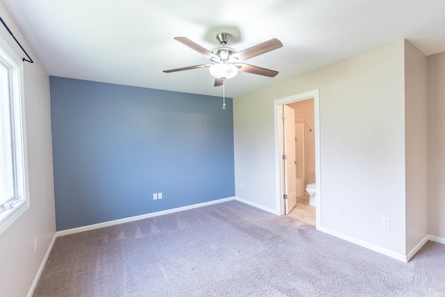 2502 Trillium Cv, Huntertown, IN 46748 - unfurnished bedroom featuring carpet floors, baseboards, and multiple windows