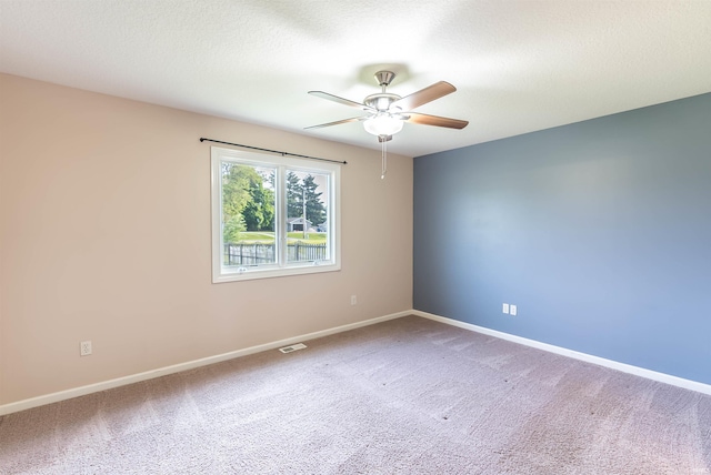 2502 Trillium Cv, Huntertown, IN 46748 - empty room with a ceiling fan, carpet, and baseboards