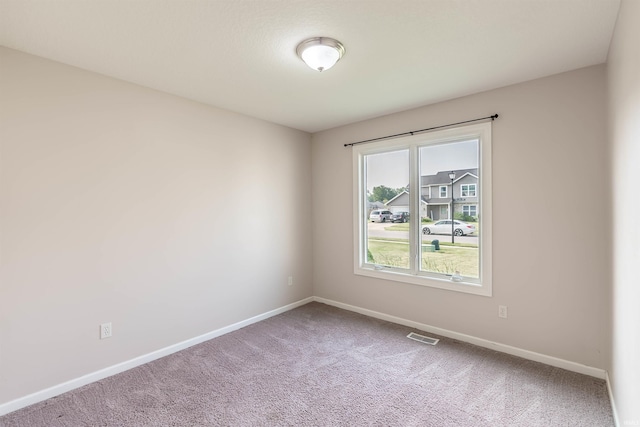 2502 Trillium Cv, Huntertown, IN 46748 - empty room featuring baseboards and carpet flooring