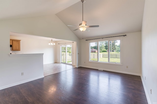 2502 Trillium Cv, Huntertown, IN 46748 - empty room with a chandelier, a ceiling fan, high vaulted ceiling, dark wood-type flooring, and baseboards