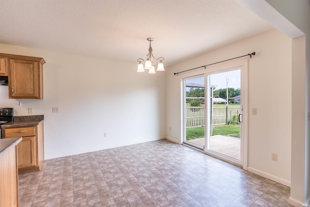 2502 Trillium Cv, Huntertown, IN 46748 - unfurnished dining area with a chandelier and baseboards