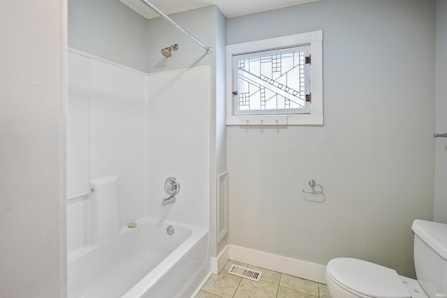 618 N Lake St, Warsaw, IN 46580 - full bathroom featuring toilet, tile patterned floors, shower / washtub combination, and baseboards