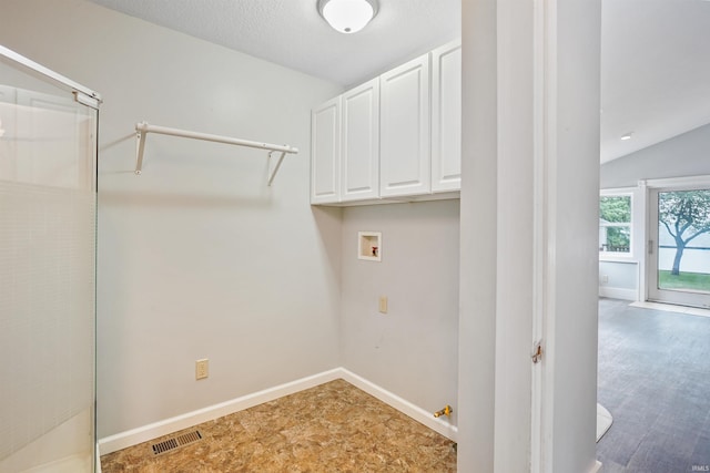 618 N Lake St, Warsaw, IN 46580 - laundry room with hookup for a washing machine, cabinet space, and baseboards
