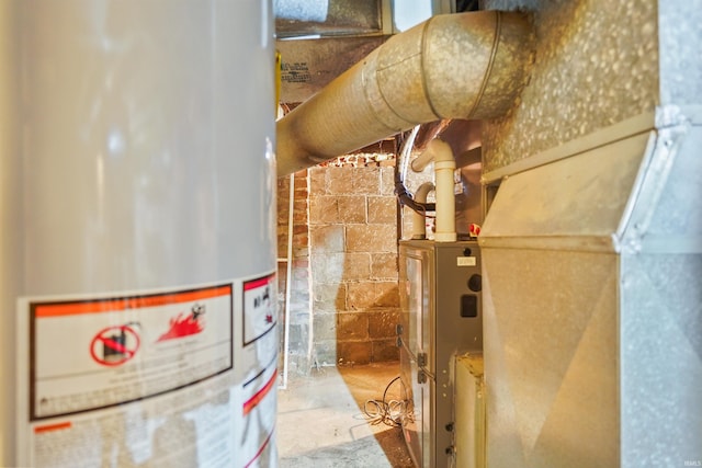 618 N Lake St, Warsaw, IN 46580 - utility room with water heater