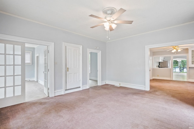 618 N Lake St, Warsaw, IN 46580 - unfurnished room with ceiling fan, carpet flooring, crown molding, and baseboards